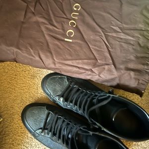 Slightly warn but  still great condtion Gucci sneakers size 13